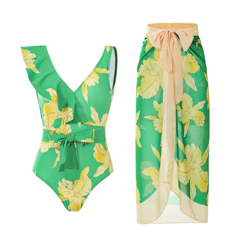 Women's solid colour spaghetti strap one-piece swimsuit with a matching skirt laid flat