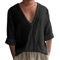Men's washed cotton long sleeve V-neck t-shirt in solid colour on a hanger