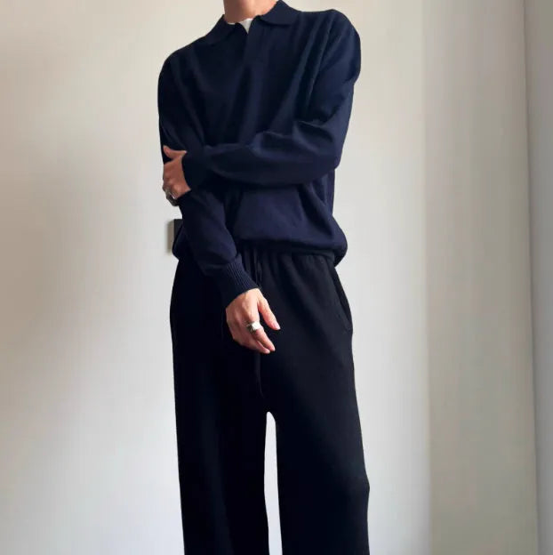 Pure wool polo sweater with lapel collar in milky white, shown in a loose fit.