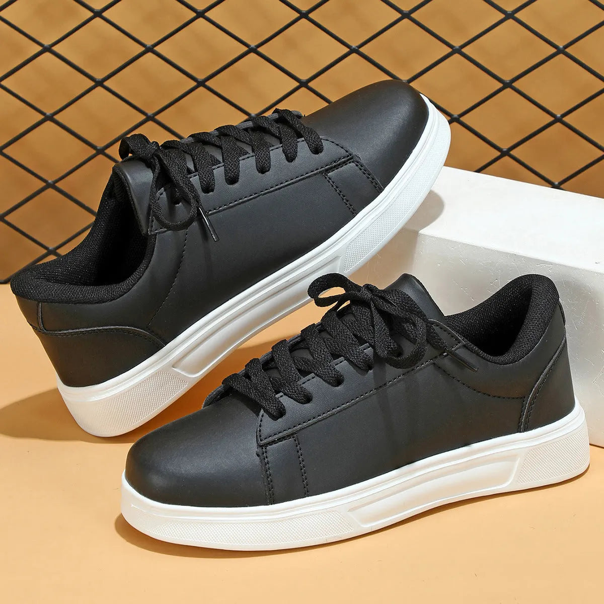 Casual beige brown platform skateboard sneaker with cross strap detail and round toe