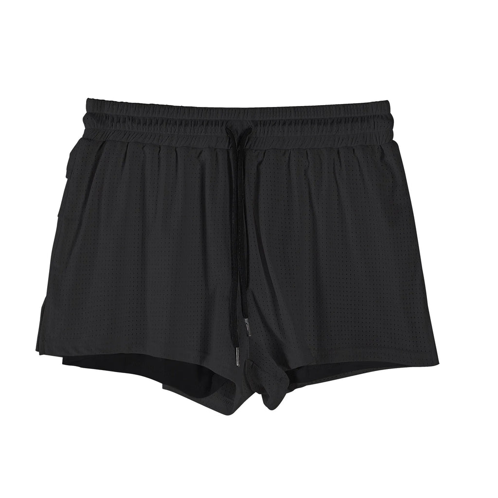 Man wearing black quick-drying nylon summer shorts with a mid-waist fit
