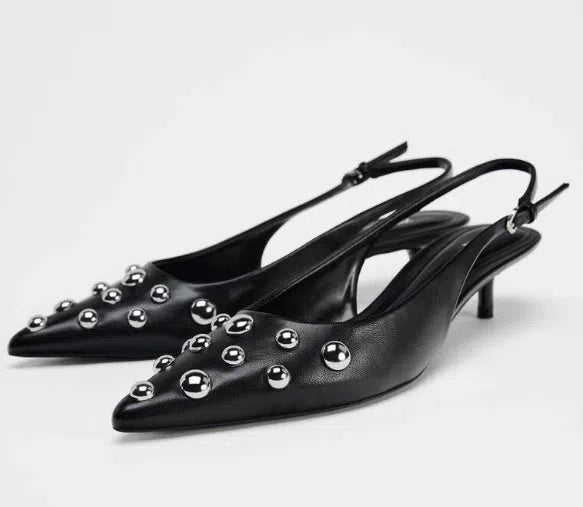 Women's black low-cut pointed-toe wedge stiletto heels with rivet decoration and slip-on design