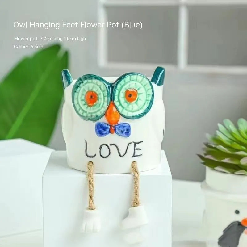Ceramic hanging foot flowerpot in a cartoon style, shown as a desktop planter for succulent plants.