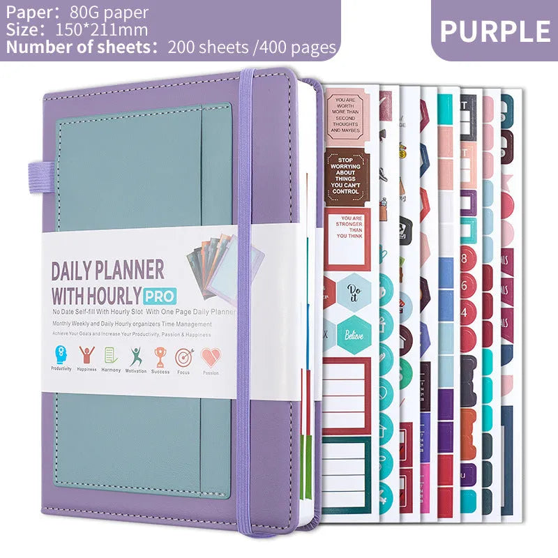 A5 no-date notebook with soft PU cover shown in purple, green, grey, black, pink, and orange, with planning stickers