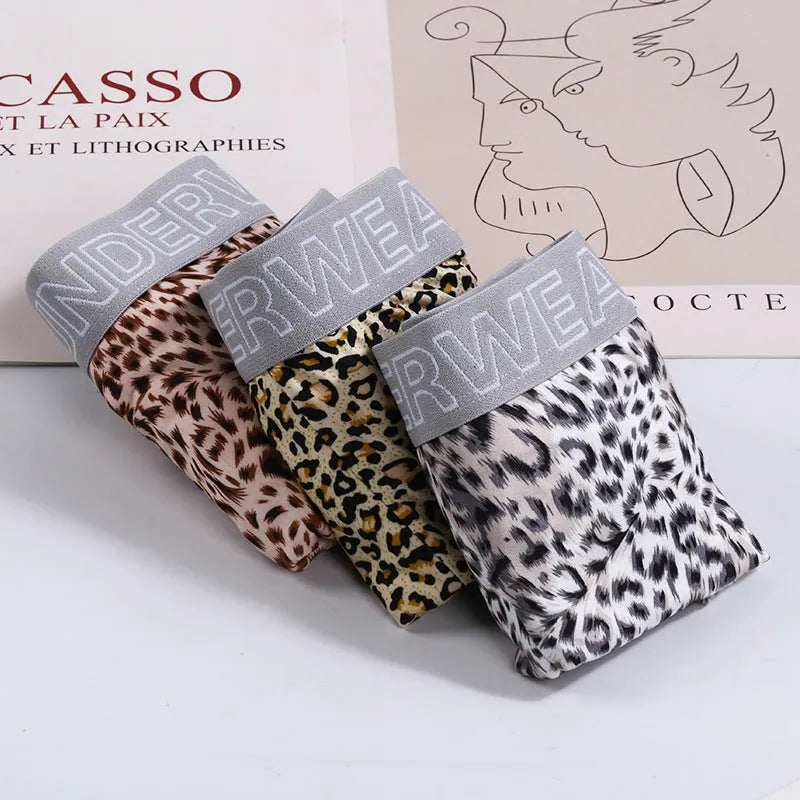 Men's loose leopard print underwear, milk silk, mid waist, quick drying, sizes M-XXXL.