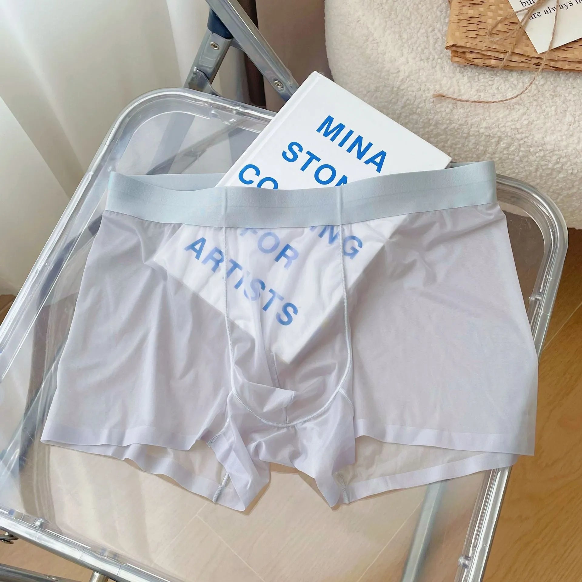 Men's thin seamless boxer shorts in quick-dry nylon fabric showing breathable construction and body shaping design