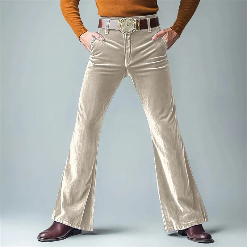 Men's slim flared trousers in gold velvet fabric, shown in multiple colours including black, blue, and dark red.