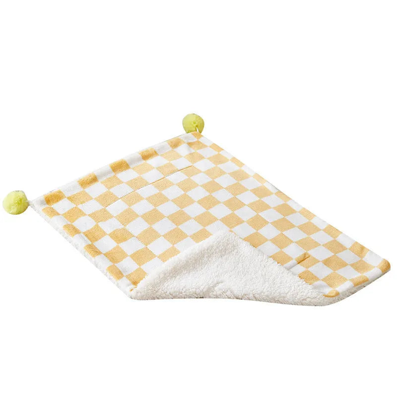Soft plush pet blanket with plaid pattern and fur ball decoration for cats and dogs