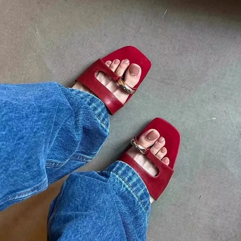 Leather outdoor slippers with rubber soles in black, white, red, and silver colours with square head design