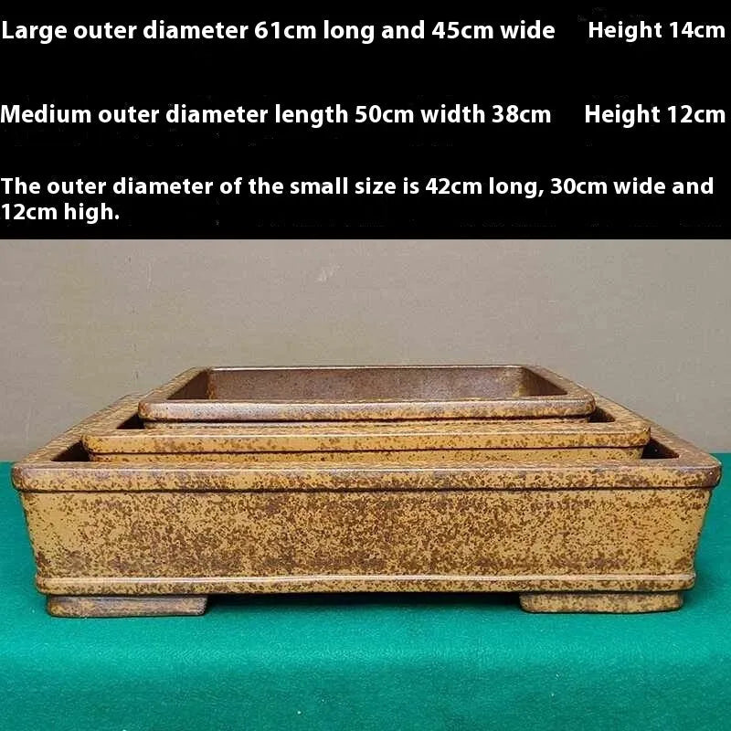 Straight-sided rectangular Yixing Zisha flowerpot in natural purple sand clay, shallow profile for plants.