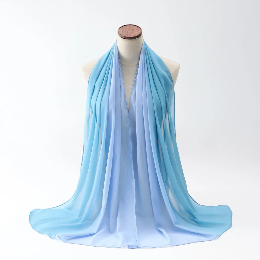 Long lightweight chiffon scarf with bubble towel texture draped over a mannequin, showing its length and soft drape.