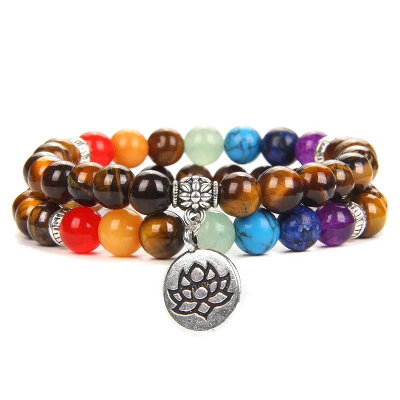 Seven chakra agate bracelet with unisex geometric beads, available in Tiger Eye, Amethyst and volcanic rock styles.