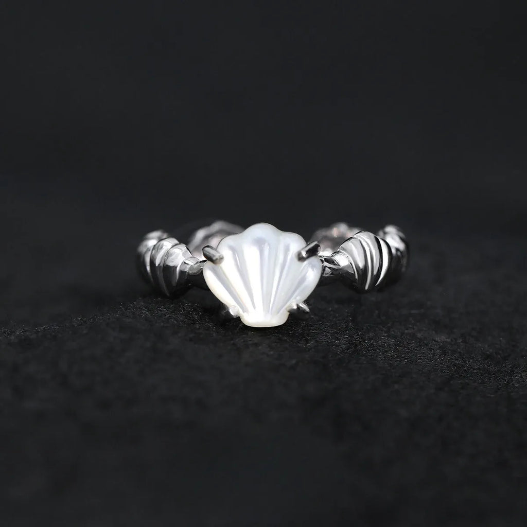 Adjustable silver women's ring with tiger eye and shell inlay in gold or white gold finish.
