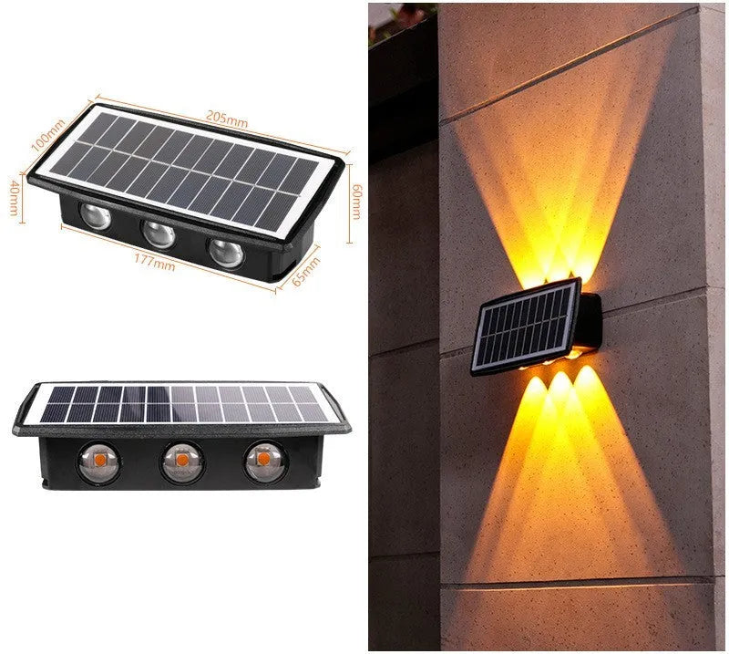 Solar outdoor wall light with 4 LED beads and glass polysilicon panel mounted on a garden wall