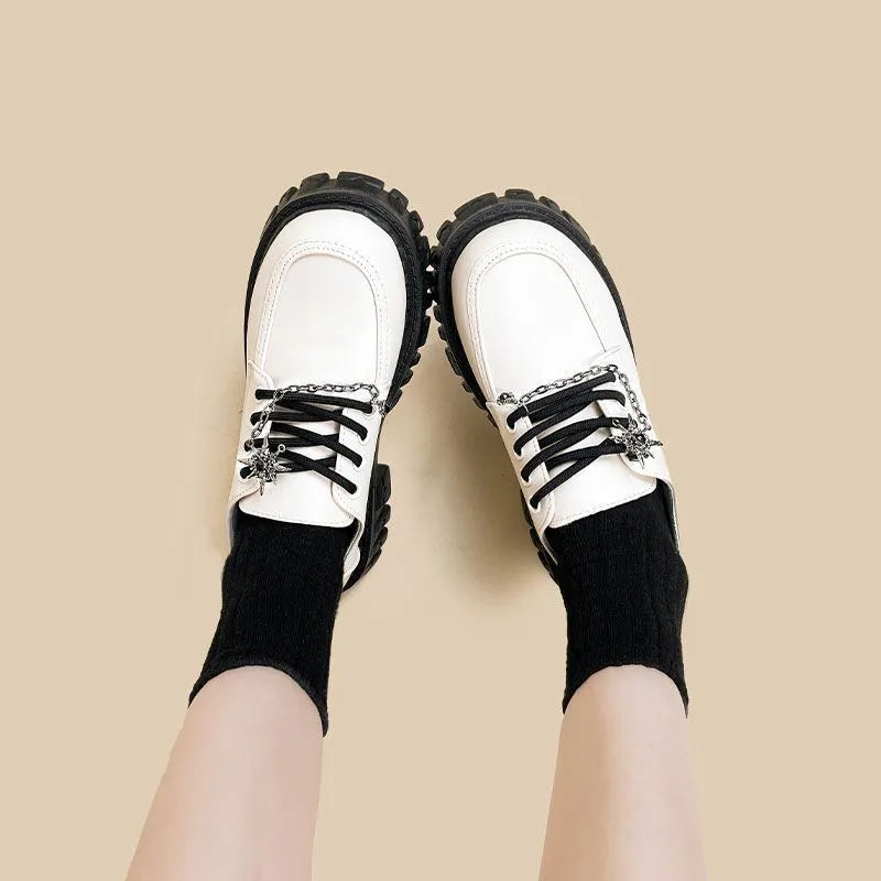 Women's Duke Asterism colour loafers with metal cross strap and round toe in college style