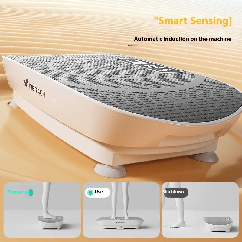 Grey portable smart power plate fat slinger on a home floor, showing its compact size and platform.