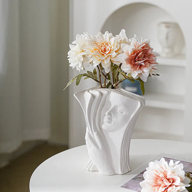 Glazed ceramic book stand in a choice of four decorative colour designs on a desktop.