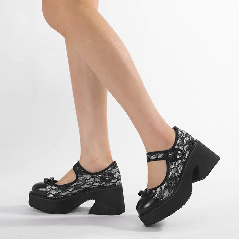 Black waterproof platform Mary Jane shoes with chunky 6–8 cm heel, mesh upper, Velcro straps, and round toe
