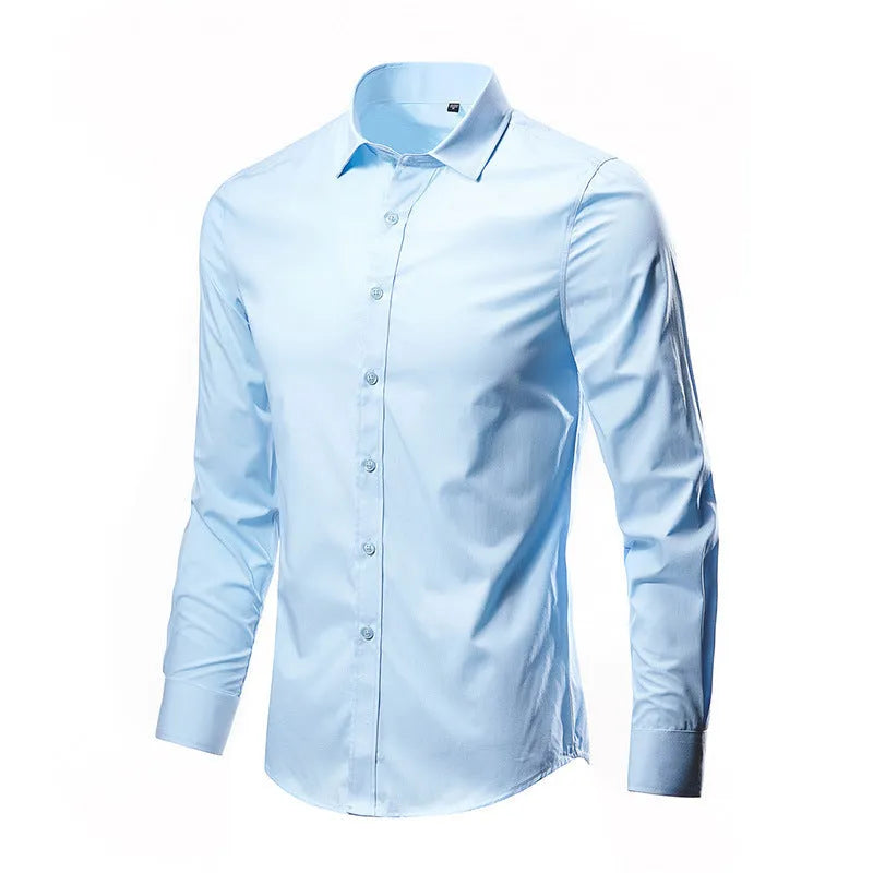 Man wearing a loose slim-fit linen long-sleeve shirt in a neutral colour.