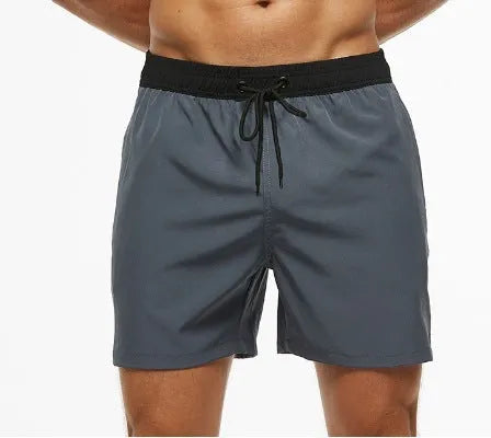 Men's blue stitching waist drawstring shorts with zippered pocket for running and fitness