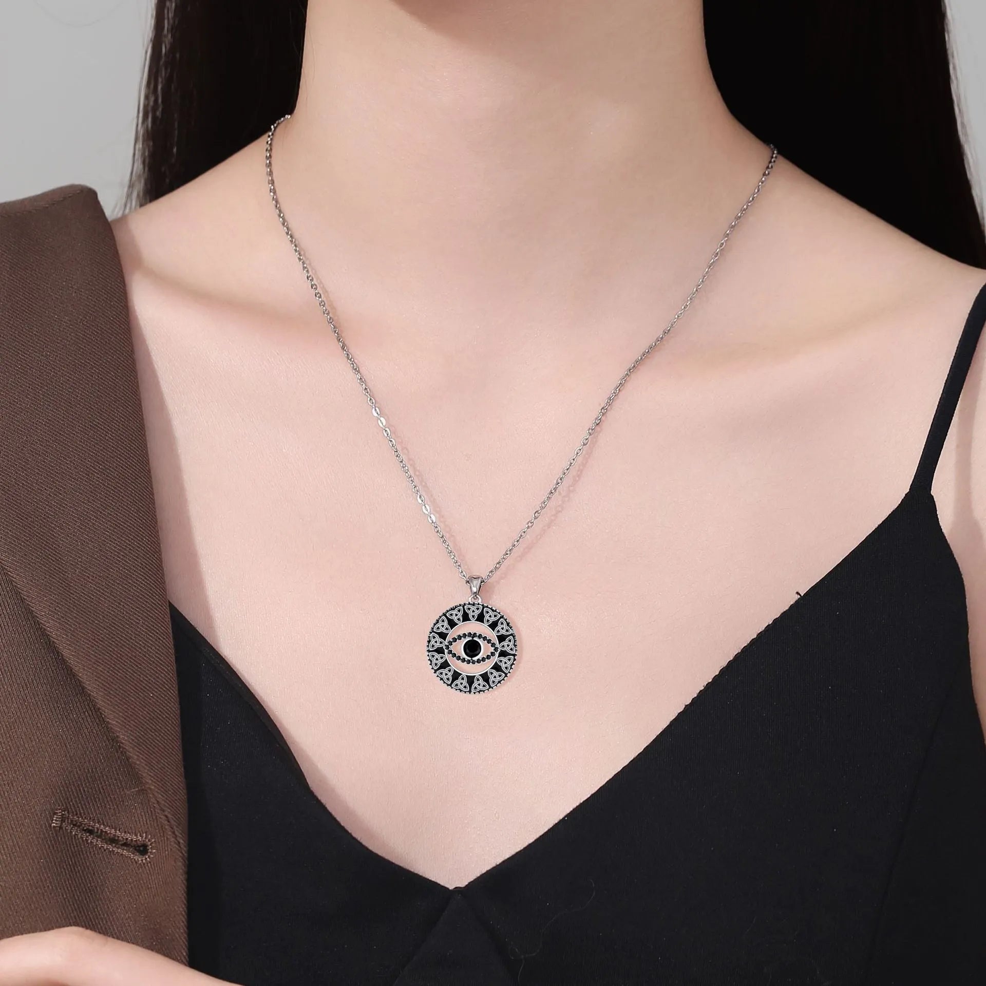 Copper Devil's Eye necklace with cross chain design for women