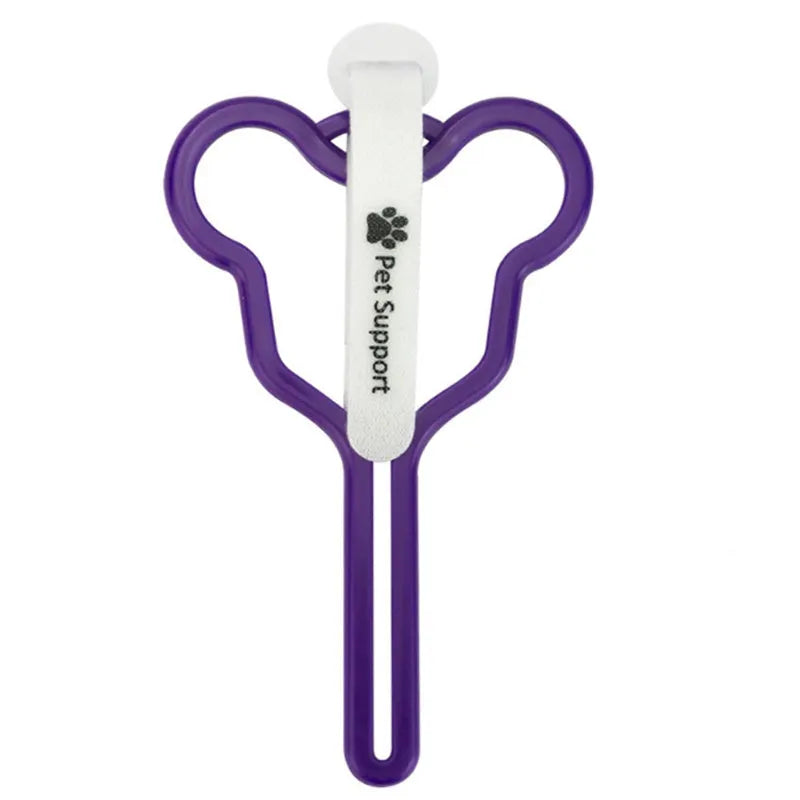 A hands-free dog poop bag holder with a hook and loop fastener strap, shown attached to a dog leash.