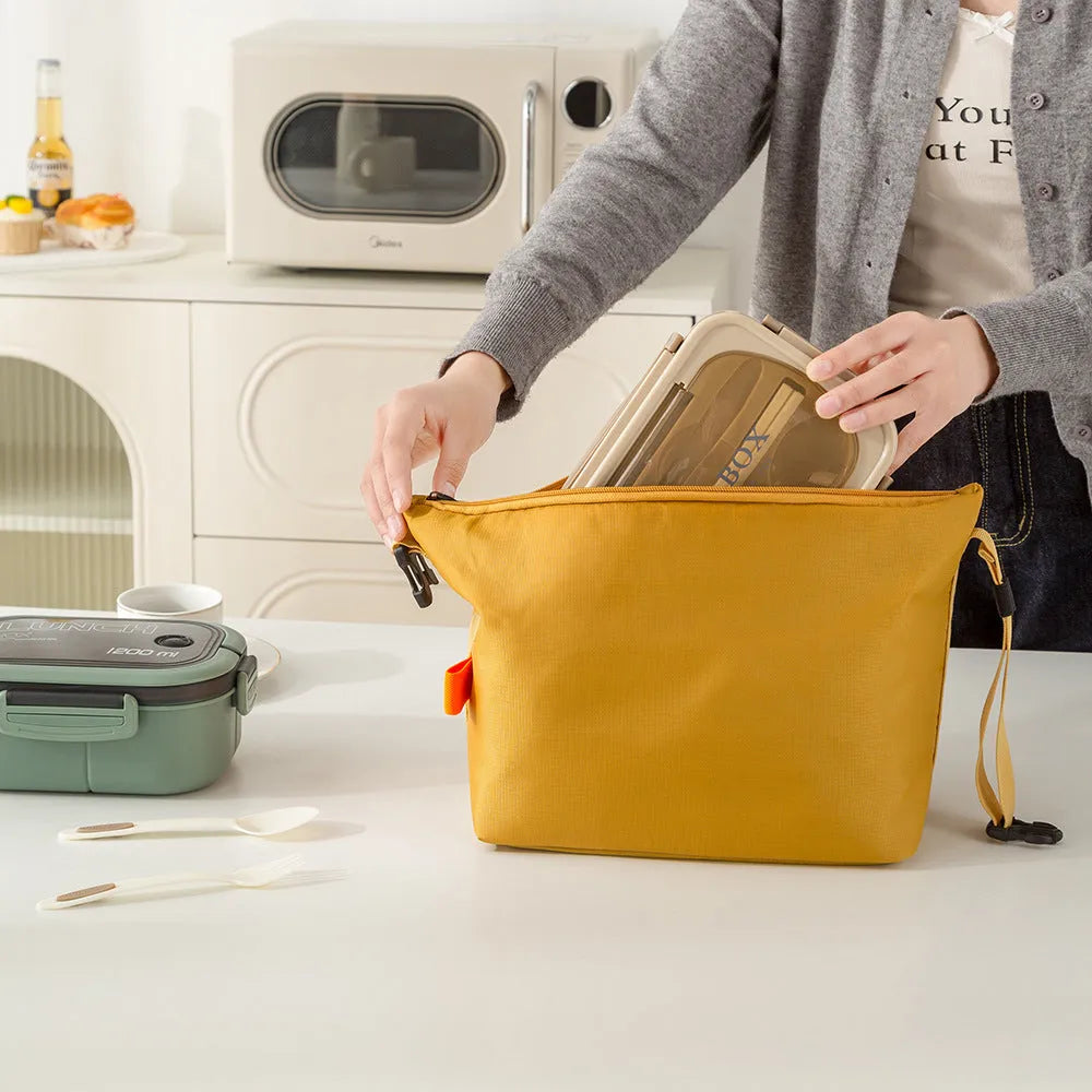 Japanese style insulated lunch bag in Oxford cloth, shown in Army Green colour with visible wide opening.