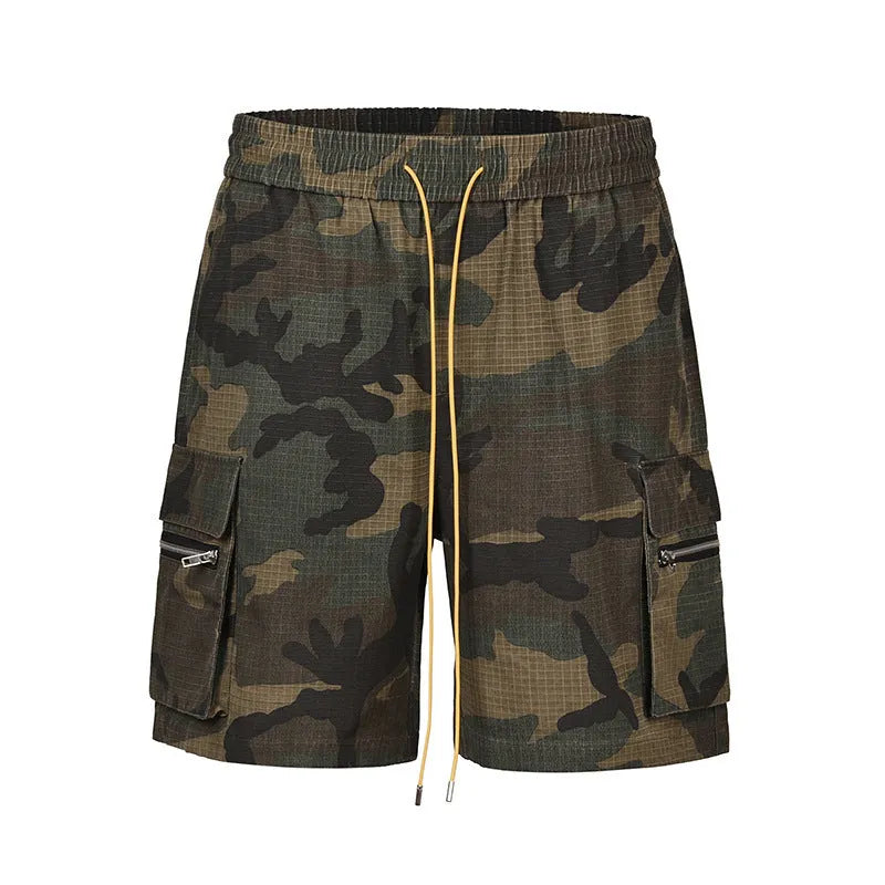 Men's camouflage pattern work shorts with multiple pockets, cropped length, and mid waist design