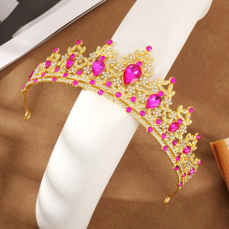 Gold alloy crown-shaped wedding hair headdress with electroplated finish on neutral background