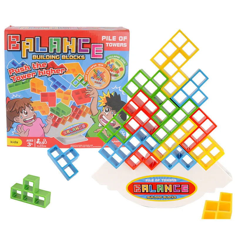 Plastic balance stacking game with coloured blocks on a tilting base, packed in a 26.5 cm box.