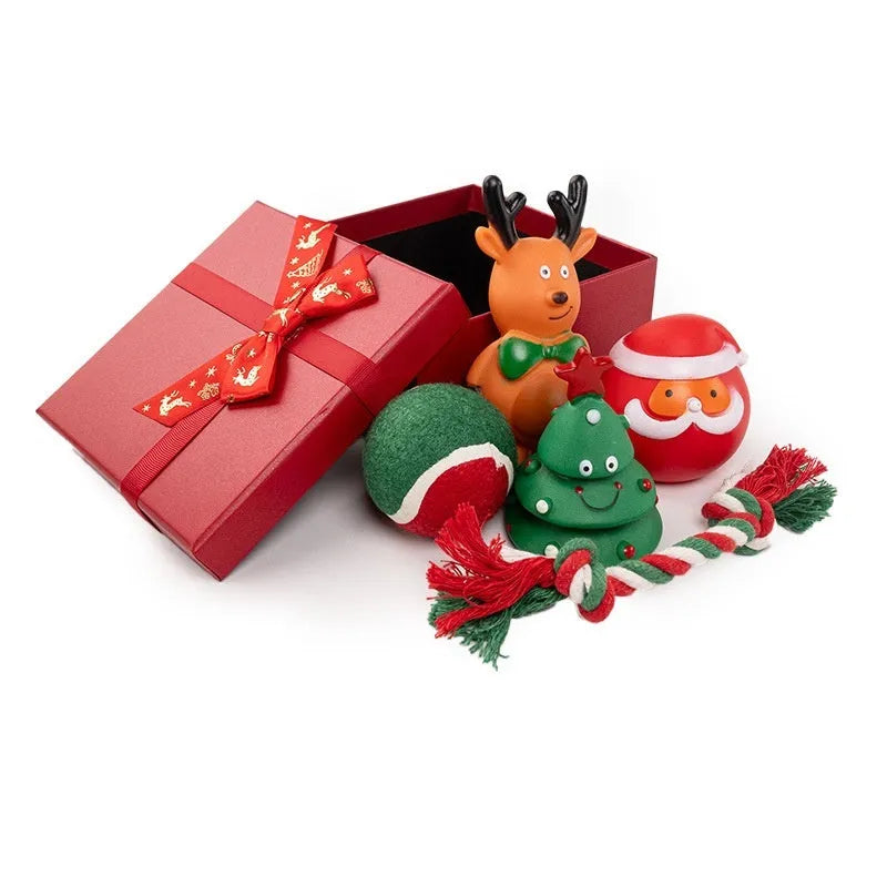 Seven Christmas vinyl dog toy gift sets with bite-resistant designs including Santa heads and holiday shapes