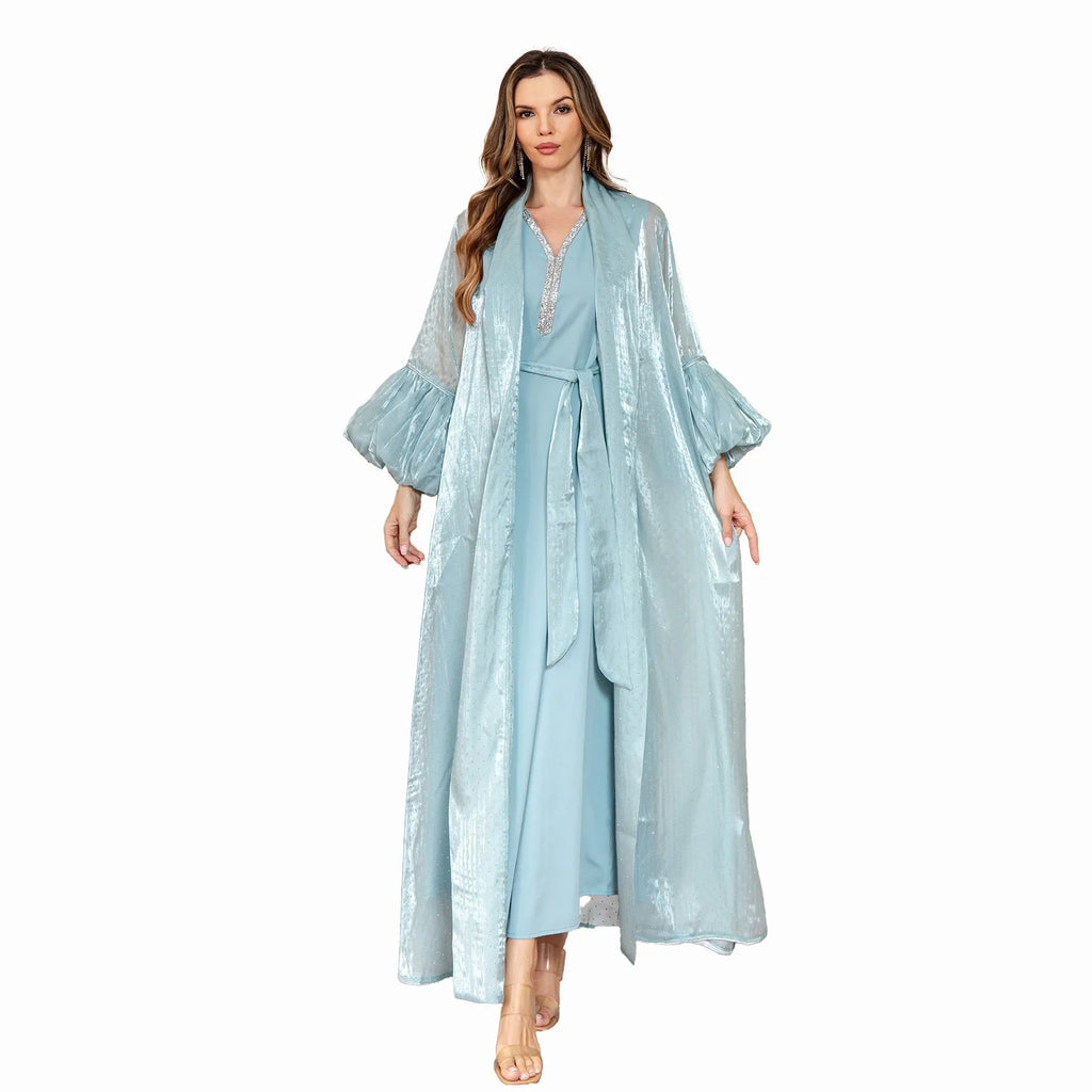 Brown Arabic two-piece dress with long sleeves, rhinestone detailing, and full-length skirt