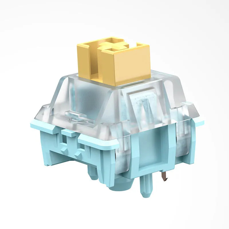36 Sea Salt Lemon coloured mechanical keyboard switches with 3-pin connectors laid out on a table.