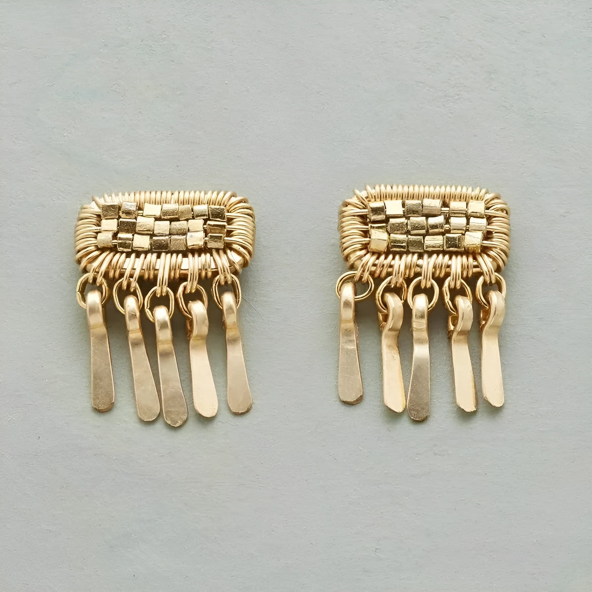 Handmade gold tassel earrings in 925 silver with geometric Longevity Lock shape for women