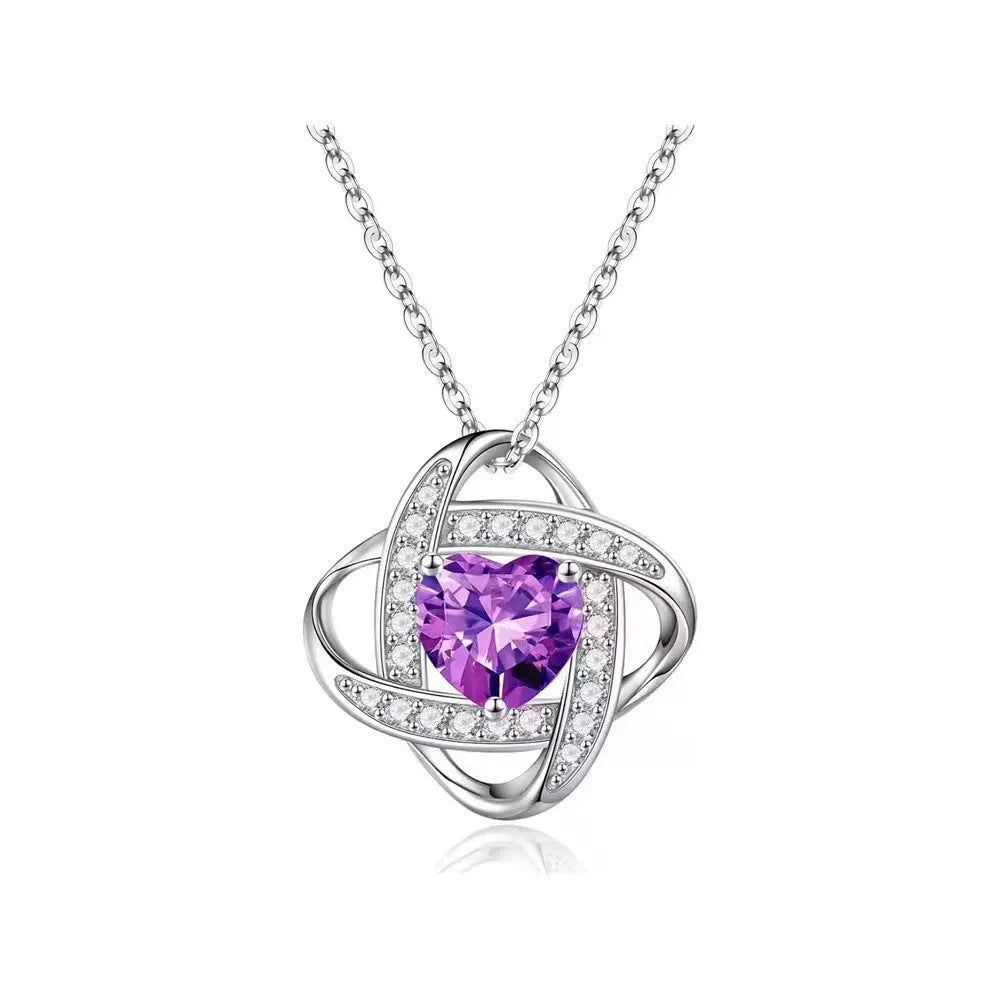 Copper heart necklace with electroplated finish in platinum diamond colours on model