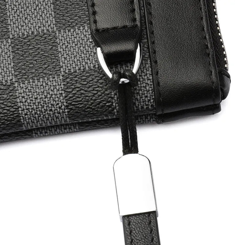 Black plaid textured men's leather clutch wallet showing front view.