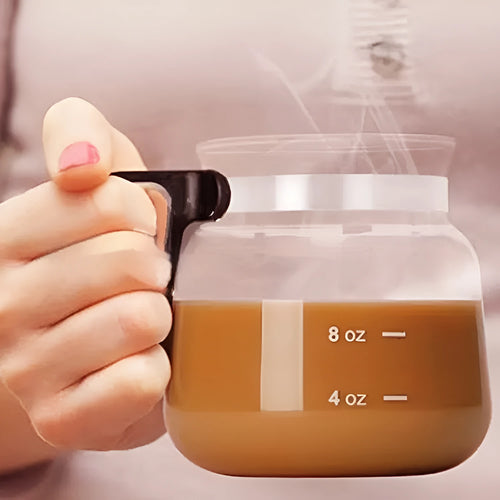 Transparent borosilicate glass coffee maker with silicone cover showing 355ml-473ml capacity