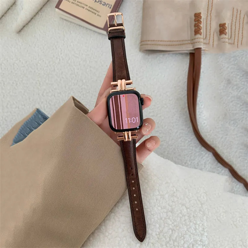 Genuine leather Apple Watch strap with metal stitching in brown colour on a dark background