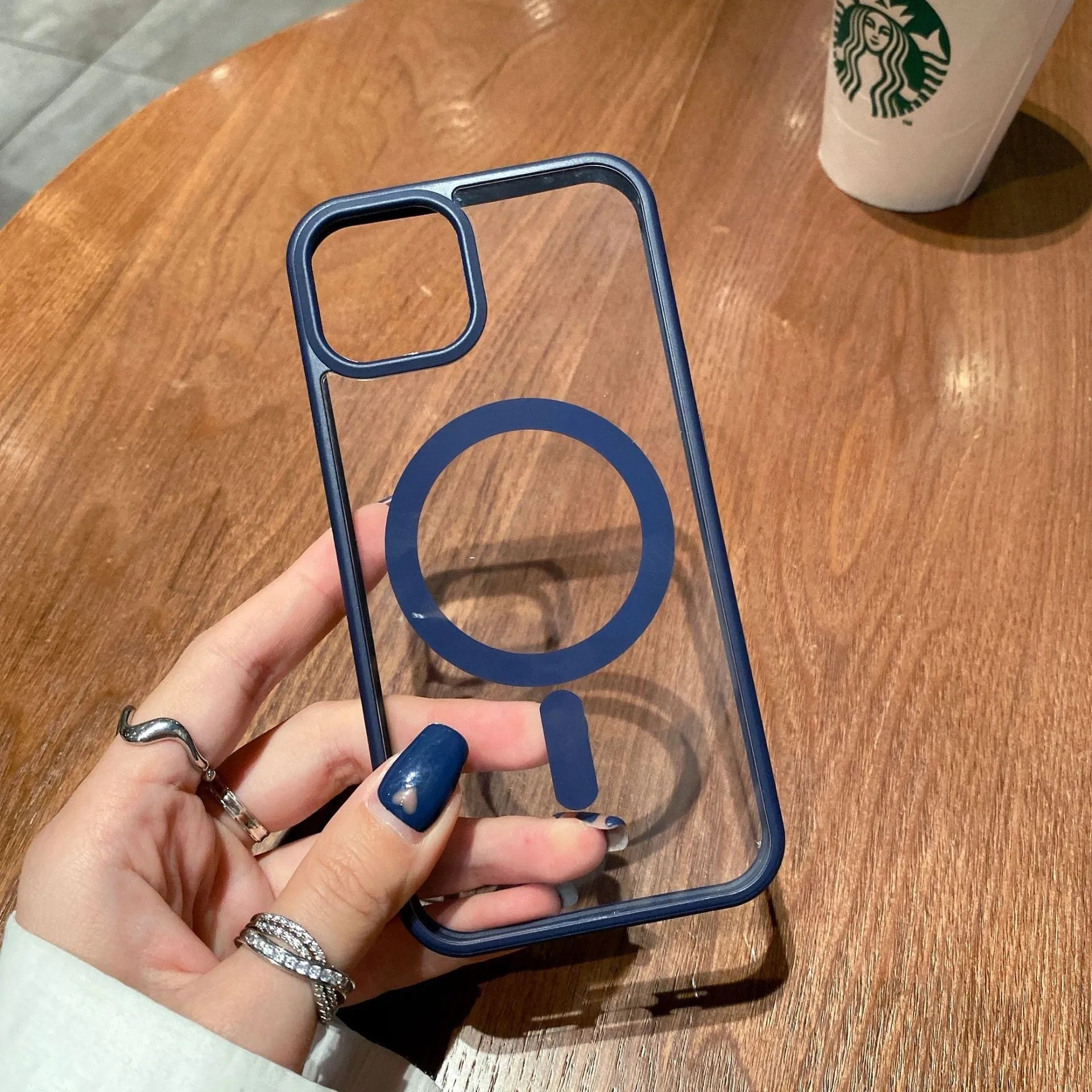 Transparent acrylic MagSafe phone case for iPhone showing magnetic ring and colour options