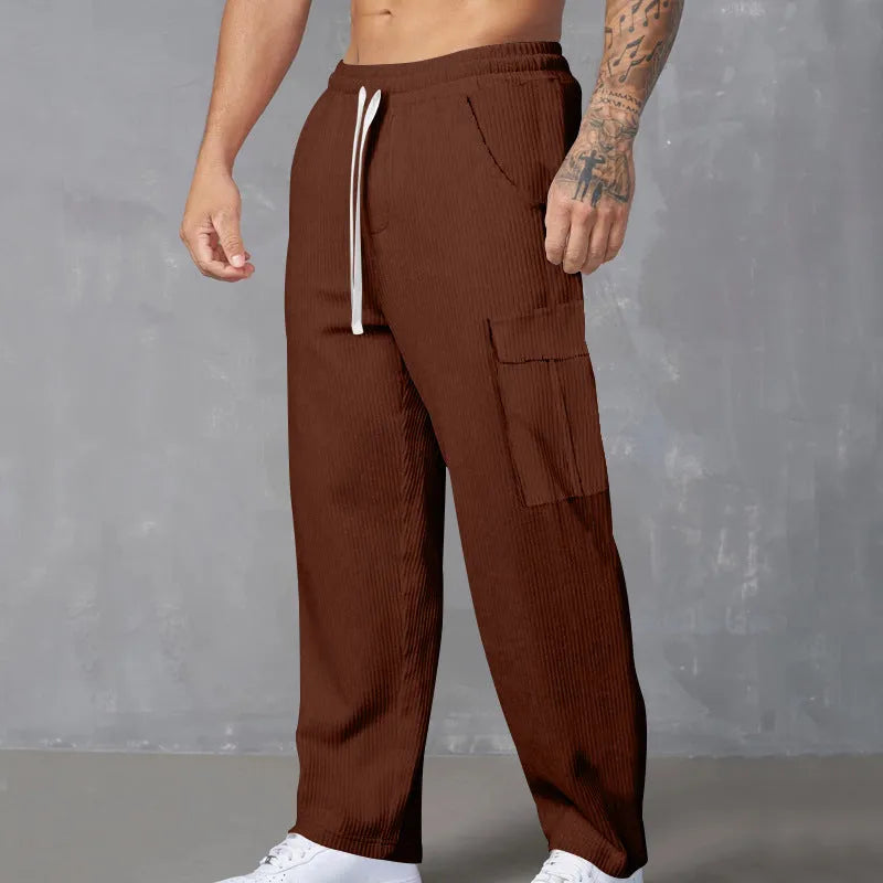 Men's straight-leg corduroy cargo trousers in a loose wide-leg fit with a drawstring waist.