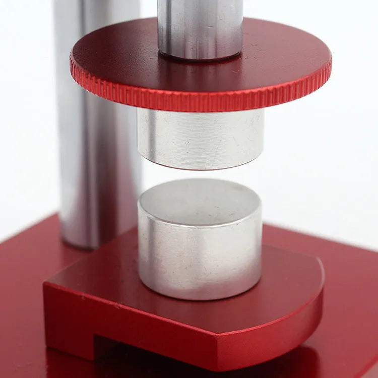 Spiral watch back cover presser tool with a set of 20 plastic moulds for watch repair.