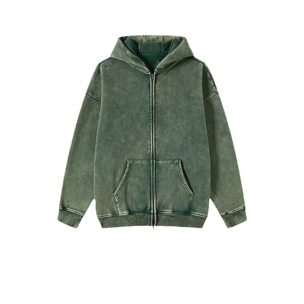 Man wearing a vintage washed cotton hooded cardigan with a fleece lining and double zipper.