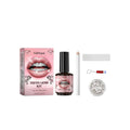 Tooth decoration kit with UV lamp, glue bottle, gem pen, cotton strips, and 100 rhinestone gems on white background