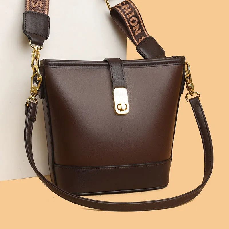 Korean-style soft PU bucket bag with dual shoulder straps in black or brown colour