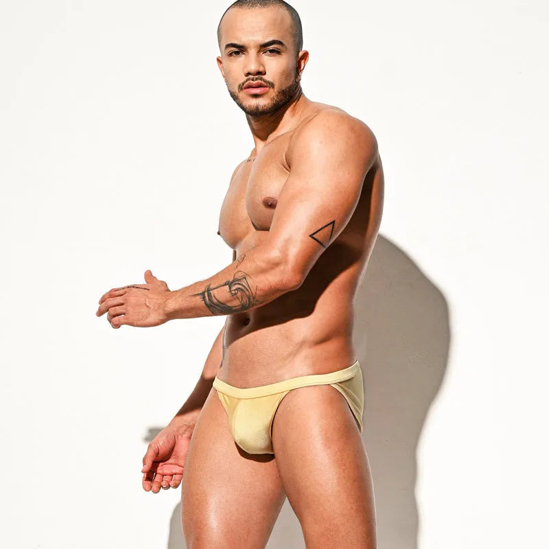 Men's high fork nylon swim briefs in bright lake blue low waist bikini beach trunks