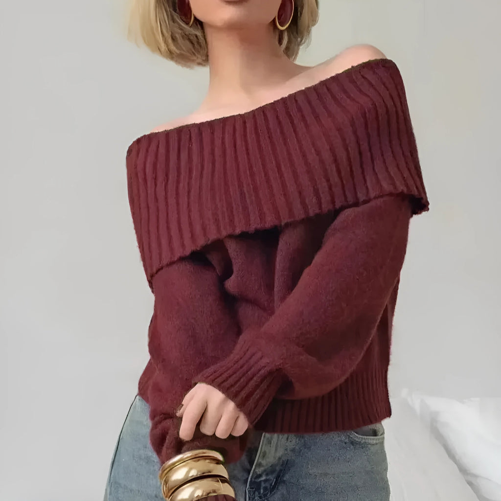 Grey off-the-shoulder sweater with a 3D textured pattern, shown on a model.