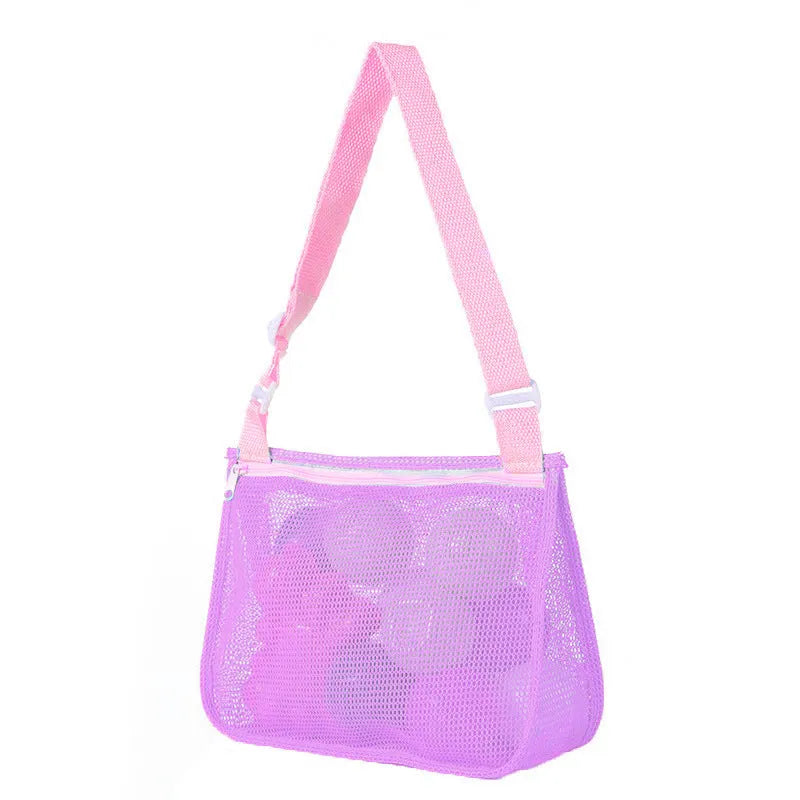 Blue nylon mesh travel storage bag with black handle and zip seal for children's clothing organisation