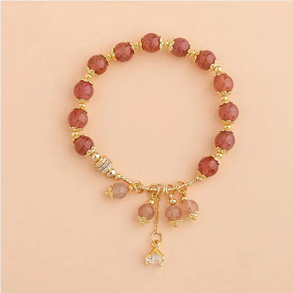 Pink strawberry quartz crystal women's bracelet with heart-shaped charm and pearl accents