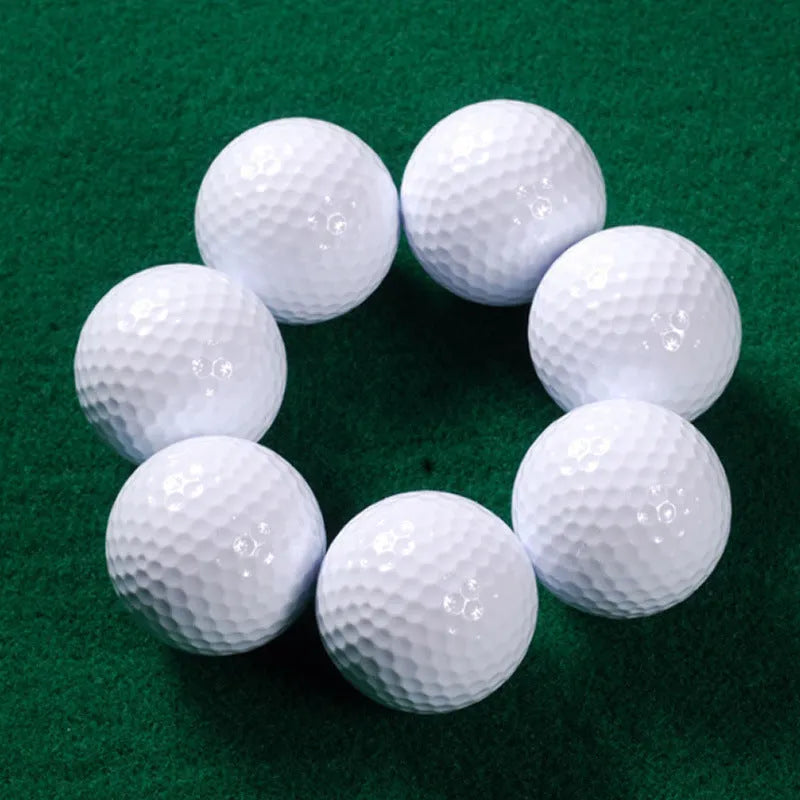 White Game Sarin Double Deck Next Game golf ball with 392 dimples on green background