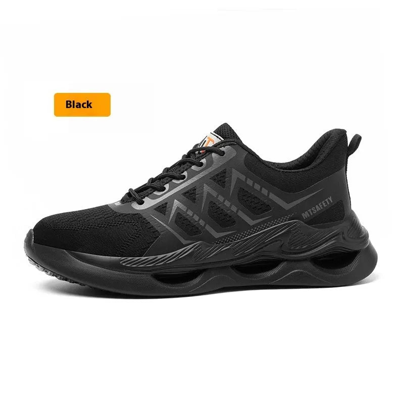 Black steel toe cap safety shoes with flat knitted uppers and rubber soles on a work surface